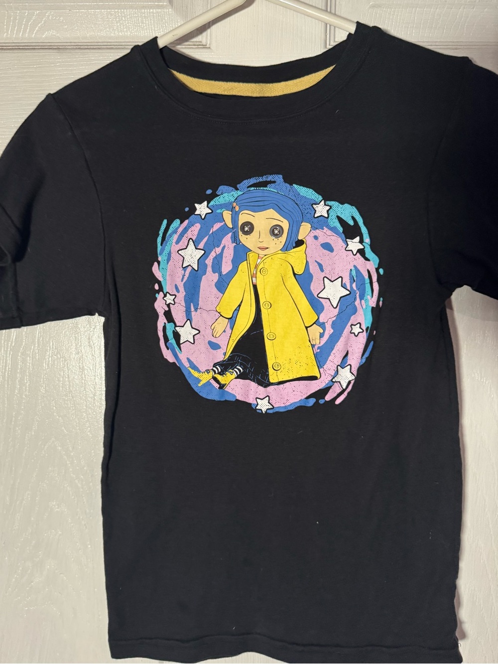 Black Graphic Tee with Yellow Raincoat Character